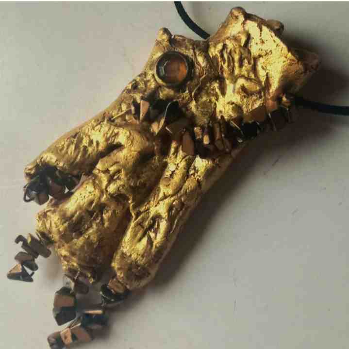 Hand-sculpted pendant necklace.