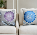 Embroidered cushion pair