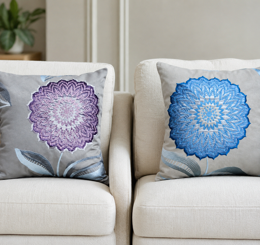 Embroidered cushion pair