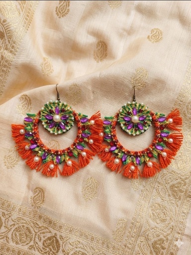 Add a touch of vibrant tradition to your look with these handcrafted statement earrings,designed to make every celebration shine.
